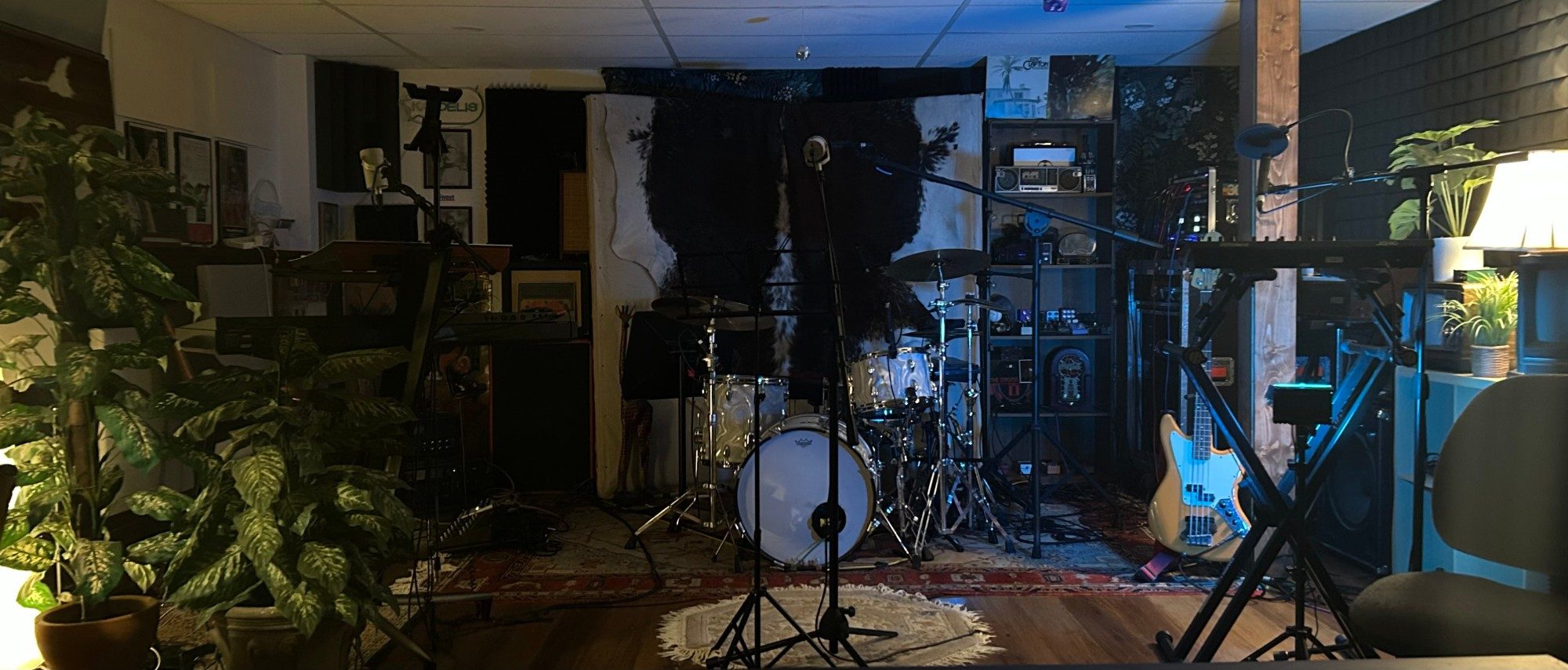 The live room at 30foot Studios in Woodstock, GA: drum kit, mics, bass, and keys set up for a session
